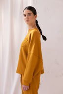 3ReCreate-Entity-Sweatshirt-Organic-Cotton-Marigold_128x192_d5340e49-1ada-4b1b-bed4-d9a91144e18b.avif