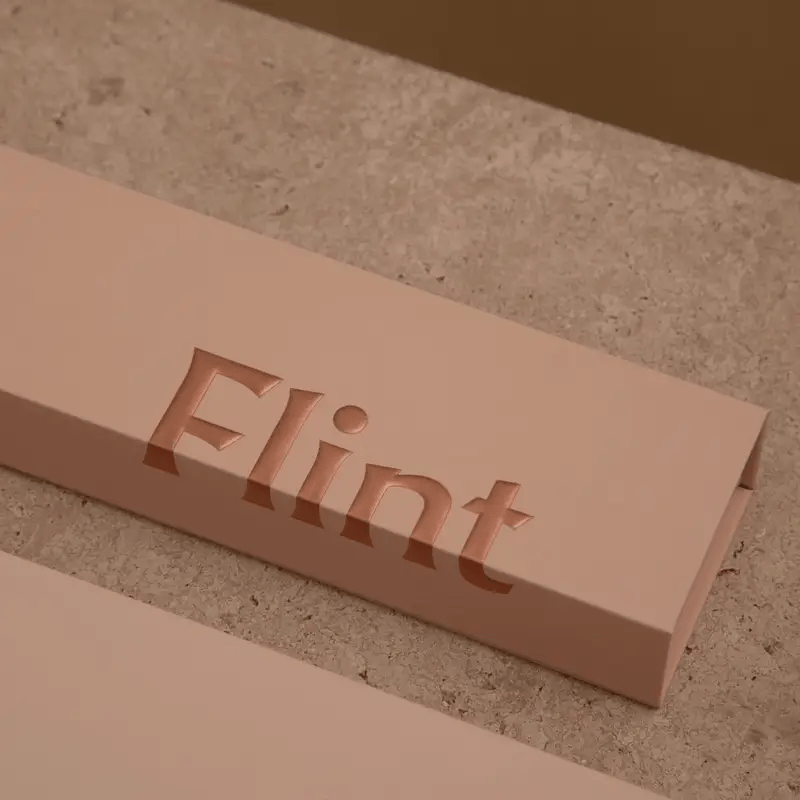 Flint_Rechargeable_Lighter_-_Rose_Gold_Packaging.webp