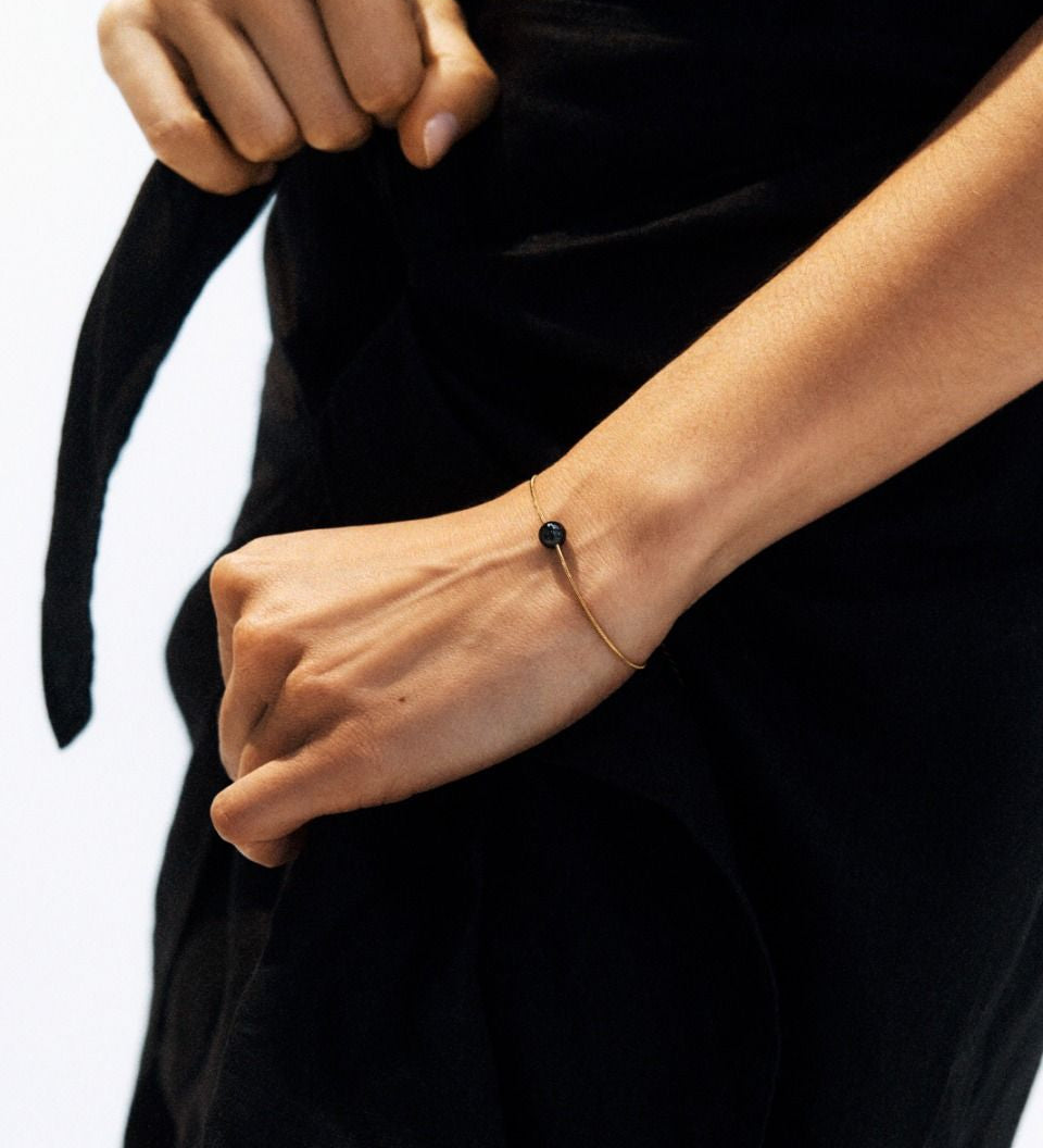 edblad-aura-bracelet-s-black-gold-cu-130365.jpg