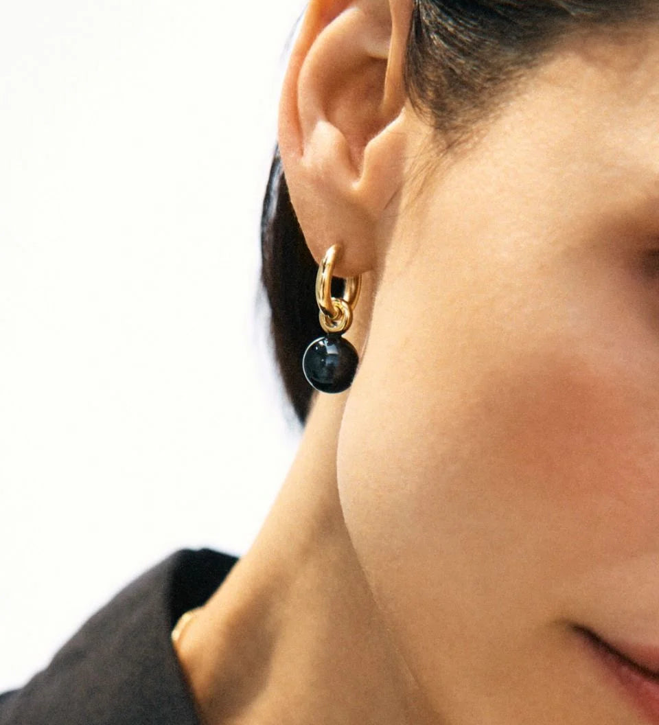 edblad-aura-hoops-l-black-gold-cu-130361.webp